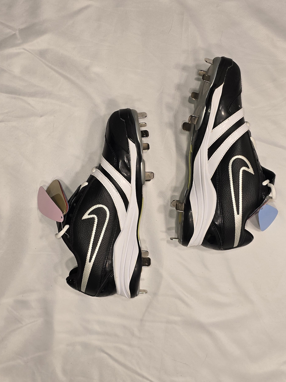 Nike Black and White Baseball Cleats with Colored Heel Tabs